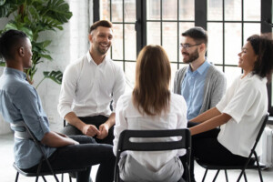 Group of intern counselors sitting in a circle